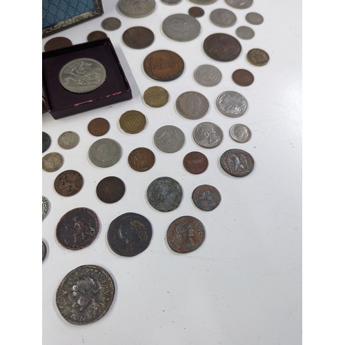 140 - Numismatic Interest - A coin collection album, presentation case, cash tin, along with a mixed group... 