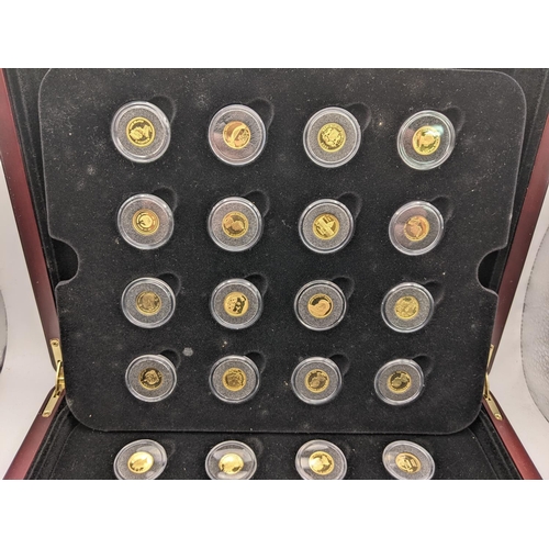 37 - The Worlds Finest Gold Miniatures - A cased set of 32 24ct Gold miniature coins to include, 2009 Gia... 