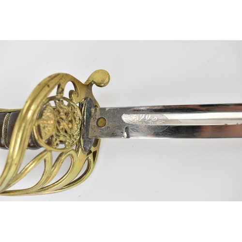 149 - A 20th Century replica of a William IV 1822 pattern Infantry Officers Sword, the blade marked with t... 