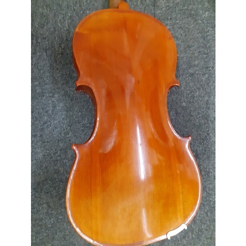 197 - A 20th Century full size violin measuring 35.5cm back and 58cm total length, strings AF together wit... 