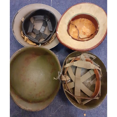 212 - Four 20th Century gents hats comprising a WW2 British Air Raid Warden's helmet, a 1982 Falklands War... 