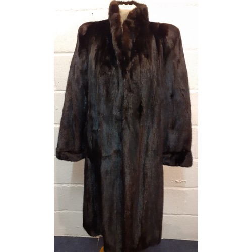 146 - A late 20th Century French Fourrures de Nord black glossy mink coat 40