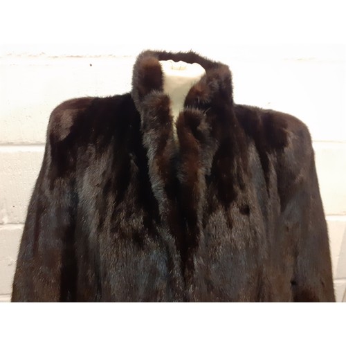 146 - A late 20th Century French Fourrures de Nord black glossy mink coat 40