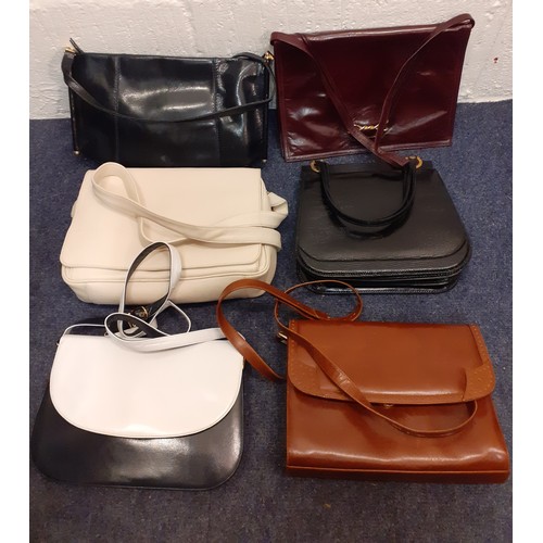 169 - A group of mid to late 20th Century ladies bags, mainly leather, to include a Bally navy and white s... 