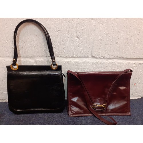 169 - A group of mid to late 20th Century ladies bags, mainly leather, to include a Bally navy and white s... 