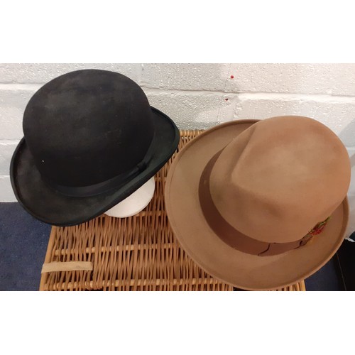 176 - Two vintage gents hats comprising a black felt bowler hat, 57cm internal circumference and a Scott &... 