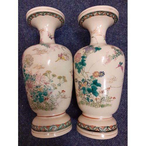 241 - A pair of early 20th Century Japanese Satsuma vases, 9