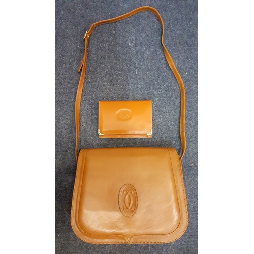 147 - A vintage French tan brown leather shoulder bag and similar purse, no labels. Location: BWR