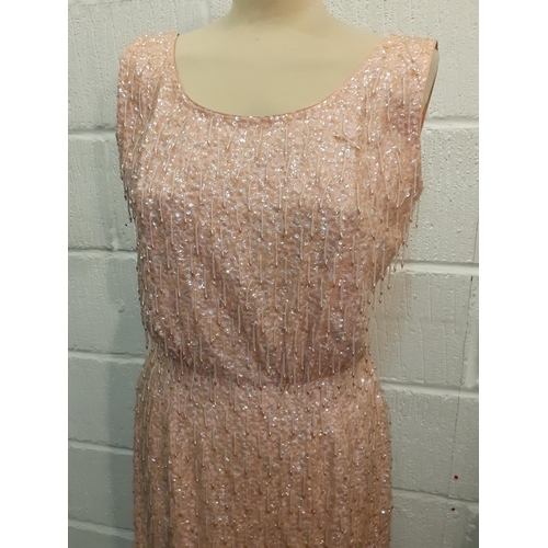 174 - A 1960's Kai-Ming for the British Crown Colony of Hong Kong pink bead and sequin full length sleevel... 