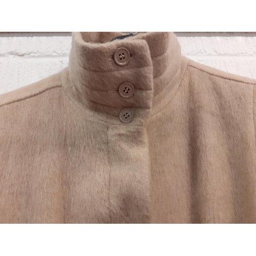 175 - A vintage Wallis beige wool mix ladies swing coat having 2 front pockets, matching belt and buttoned... 