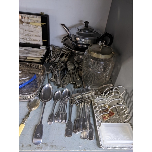 269 - A quantity of pewter and silver plated items to include an Osiris secessionist tea glass holder, mix... 