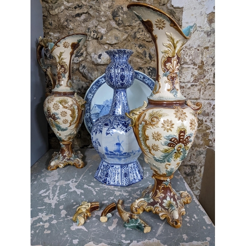 271 - Ceramics to include a Delft pottery bulb vase, a Boch Delft ware charger, and a pair of 19th century... 
