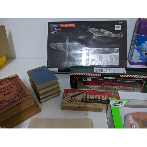 284 - A mixed lot of model aircraft, diecast vehicles and other toys and books to include Observer books o... 