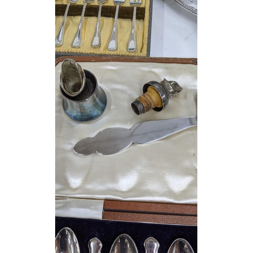 303 - Mixed silver plated items to include boxed sets of cutlery with a set of twelve teaspoons and sugar ... 