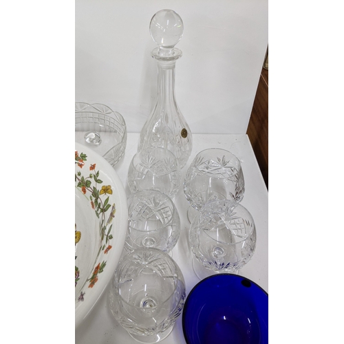 304 - A mixed lot to include the Botanical Garden bowl and a jug, a ceramic floral lamp, crystal cut glass... 