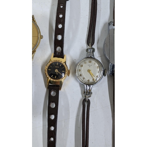 313 - A collection of mixed wristwatches to include a ladies Oris manual wind watch on a leather strap, a ... 