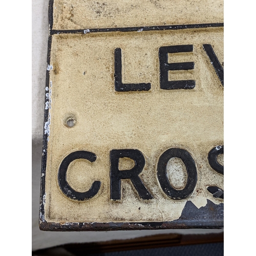 327 - A late 20th century painted cast iron Level Crossing sign
Location: A1F