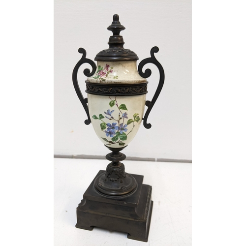 336 - A Victorian bronze and ceramic urn style side piece
Location: 3.2