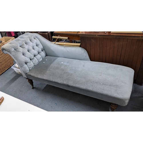 392 - A late Victorian blue button back upholstered chaise longue on walnut turned legs, 78cm h x 180cm w
... 