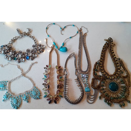 217 - A quantity of modern costume jewellery, mainly bead necklaces and vintage brooches to include a blac... 