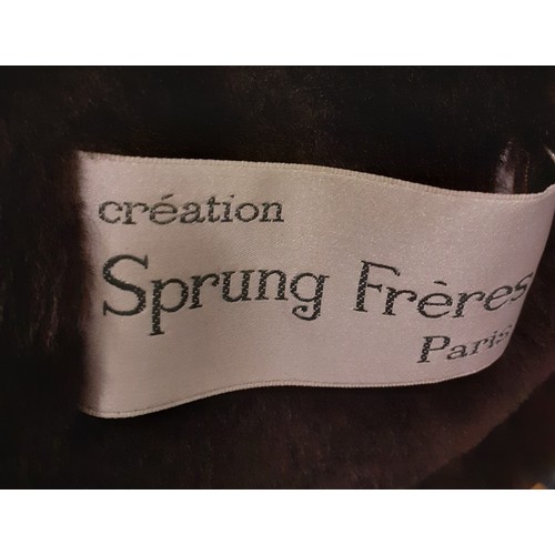 225 - A vintage French 'Creation Spung Freres' ladies brown sheepskin  coat having overturned cuffs, 2 fro... 