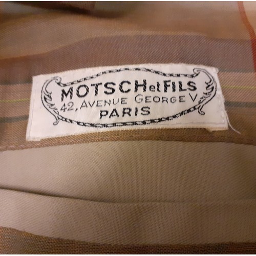 228 - A vintage Barstons camel coloured rain mac for Motsch & Fils, Paris having a double breasted front f... 