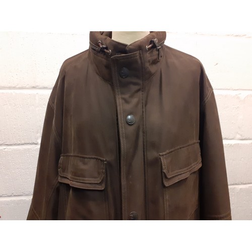 229 - Pierre Cardin-A late 20th/early 21st Century brown cotton canvas coat with padded lining and 2 inter... 