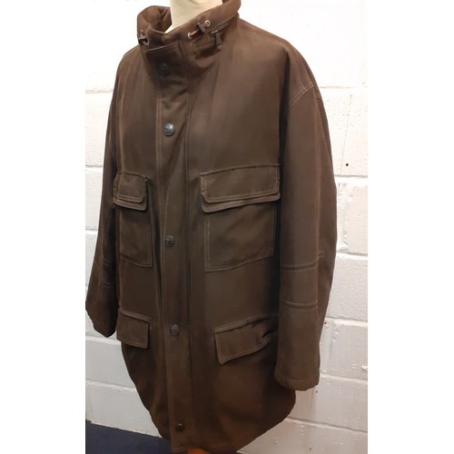 229 - Pierre Cardin-A late 20th/early 21st Century brown cotton canvas coat with padded lining and 2 inter... 