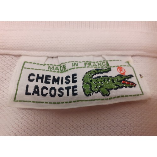 230 - Lacoste-Two new sports t-shirts in yellow and lime and 6 vintage examples, mixed sizes 46,48 and Lar... 