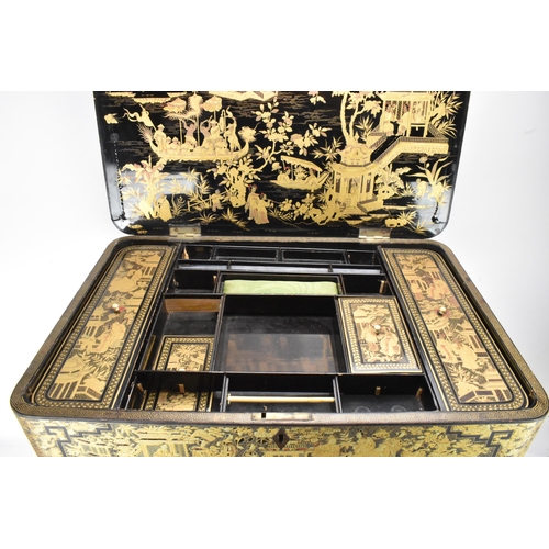 125 - An early 19th century chinoiserie black lacquered and gilt highlighted work box, the box of rounded ... 