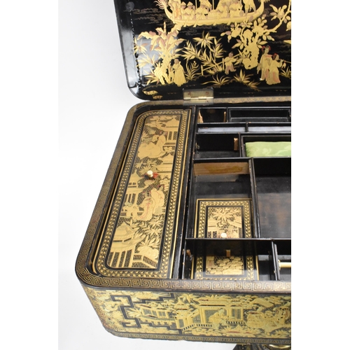 125 - An early 19th century chinoiserie black lacquered and gilt highlighted work box, the box of rounded ... 