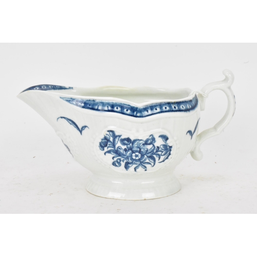 127 - An 18th century Worcester porcelain blue and white sauce boat, circa 1770-80, moulded with vertical ... 