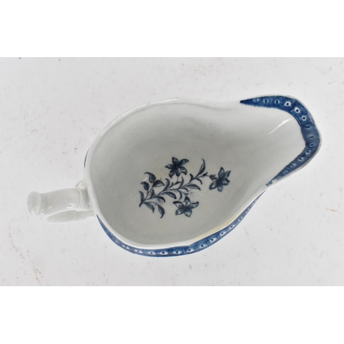 127 - An 18th century Worcester porcelain blue and white sauce boat, circa 1770-80, moulded with vertical ... 