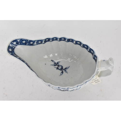 128 - An 18th century Worcester porcelain blue and white sauce boat, circa 1770-80, moulded fluted form an... 