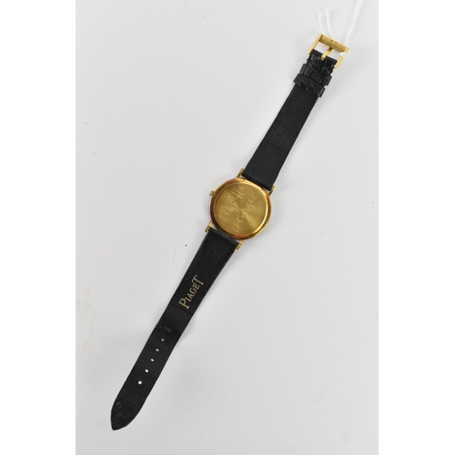 2 - An Piaget ultra-slim, automatic, gents, 18ct gold wristwatch, retailed by Aspreys, having a silvered... 