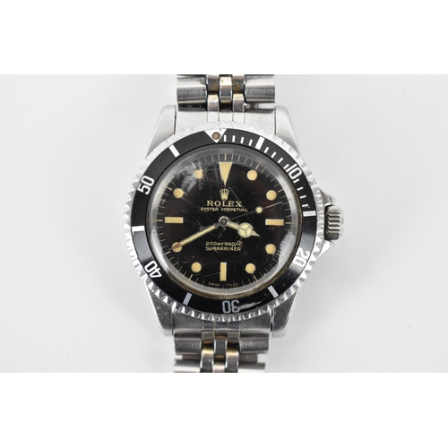 A Rolex Submariner, automatic, gents, stainless steel wristwatch, circa 1966, having a black dial, centre seconds, luminous hands and markers, on a later Rolex style bracelet, calibre 1520 movement numbered 1387XXX, reference number 5513, case back 1.66, 39.55mm, not ticking at present but balance swings freely
Provenance: One owner from new, purchased in 1966