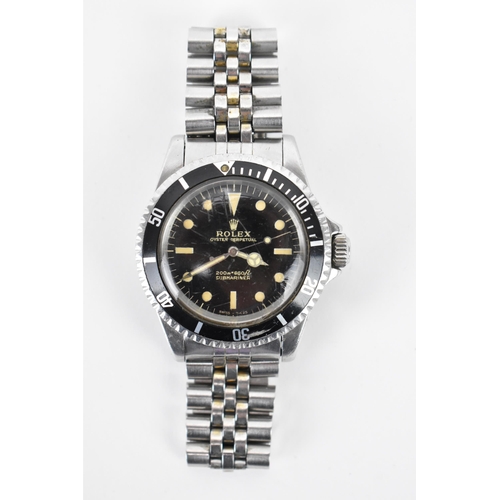 5 - A Rolex Submariner, automatic, gents, stainless steel wristwatch, circa 1966, having a black dial, c... 