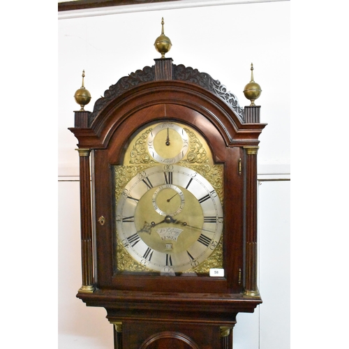 58 - A George III mahogany longcase clock, the case having an arched top with three ball and spike finial... 