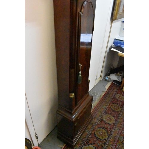 58 - A George III mahogany longcase clock, the case having an arched top with three ball and spike finial... 