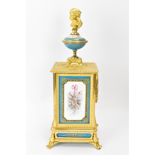 59 - A late 19th century French mantle clock, the gilt metal case cast with floral scoll decoration, wing... 