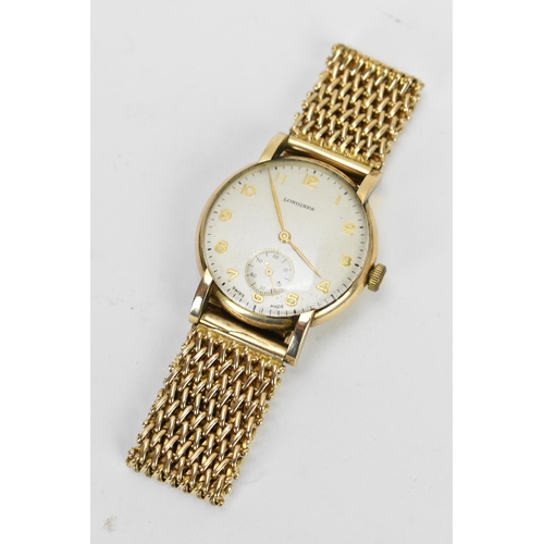 72 - A Longines, manual wind, gents, 9ct gold wristwatch, circa 1950s, having a silvered dial, subsidiary... 