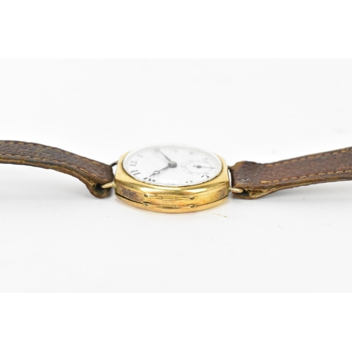 73 - A 1920s, manual wind, gents, 18ct gold wristwatch, having a white enamel dial, subsidiary seconds di... 