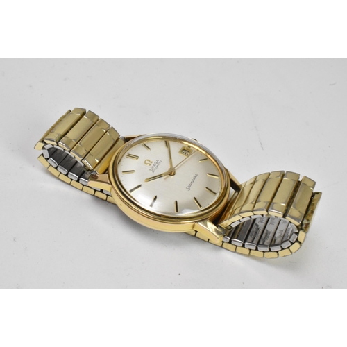 85 - An Omega Seamaster, automatic, gents, gold plated wristwatch, having a silvered dial, centre seconds... 