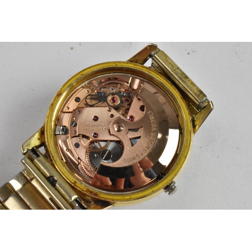 85 - An Omega Seamaster, automatic, gents, gold plated wristwatch, having a silvered dial, centre seconds... 