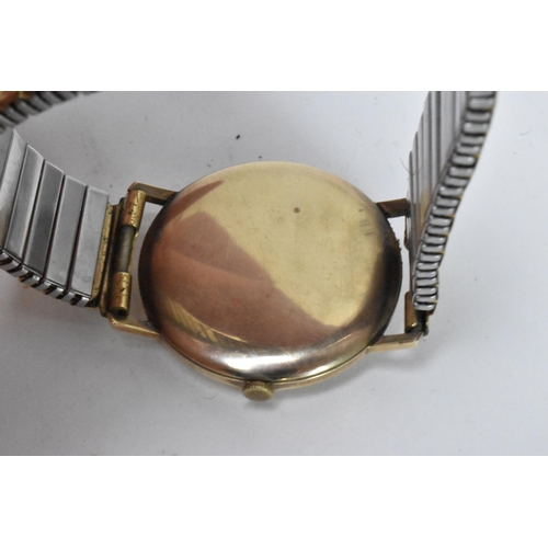 86 - An Accurist, manual wind, gents, 9ct gold wristwatch, having a silvered dial, subsidiary seconds dia... 