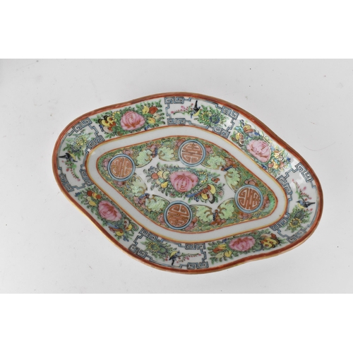 173 - A Chinese canton famille rose circa 1900 twin handled gravy boat with tray, togehter with a mid/late... 