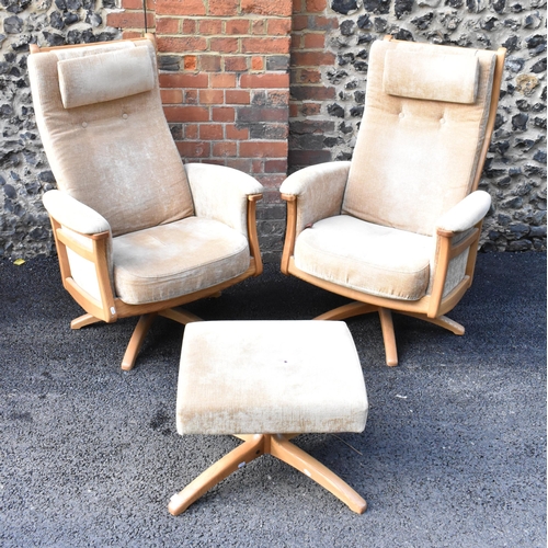 204 - A pair of vintage Ercol Gina light elm manual reclining armchairs upholstered in beige fabric with h... 