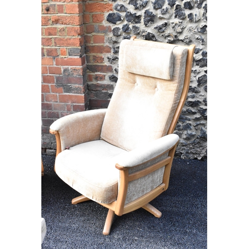 204 - A pair of vintage Ercol Gina light elm manual reclining armchairs upholstered in beige fabric with h... 