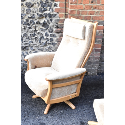 204 - A pair of vintage Ercol Gina light elm manual reclining armchairs upholstered in beige fabric with h... 