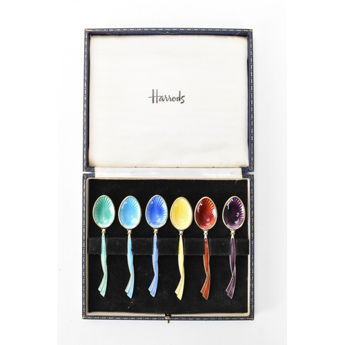 213 - A cased set of six mid 20th century coffee bean spoons, retailed by Harrods, all having guilloche en... 